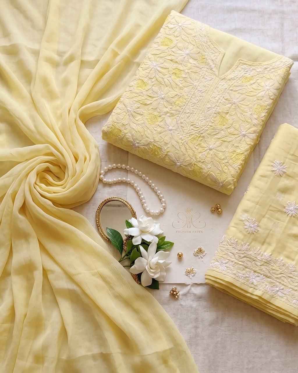Yellow mulmul chikankari suit